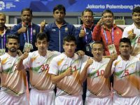 A Sepak-Takraw Team Showing Thumbs up After Their Victory.