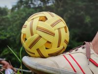 Image showing a players kicks the sepak-takraw ball