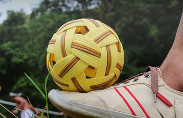 Image showing a players kicks the sepak-takraw ball